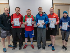 Winners of the Run for Hope show off certificates